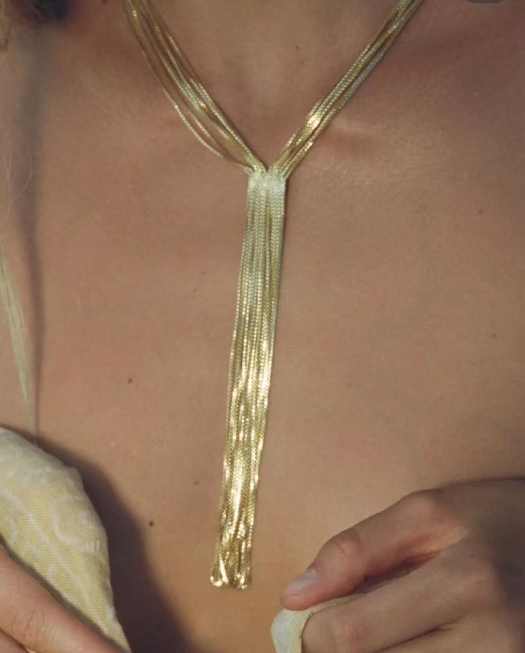 Exclusive design of the premium gold tassel necklace